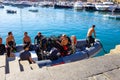 Santa Margherita Ligure, Italy - September 13, 2019: A group of divers on inflatable boat get ready for a dive