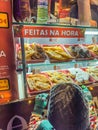 Santa Maria da Feira, Portugal - december 2 2023. Children window shopping on traditional Perlim Christmas market in Santa Maria