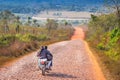 Santa Maria de Fe, Misiones, Paraguay - Onward Together: Couple on Motorbike headed out into Countryside outside Santa Maria, Para