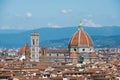 Santa Maria del Fiore huge Brunelleschi\'s dome and Giotto\'s Bell Tower in narrow old Florence city streets. Day vi Royalty Free Stock Photo