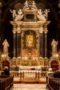 Santa Maria del Popolo Church. Rome. Italy. Worshipers and altar