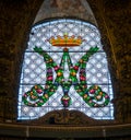 Stained glass in the Church of Santa Maria dell`Orto, in Rome, Italy. Royalty Free Stock Photo