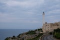 Santa Maria di Leuca, Italy. Iconic lighthouse located next to Basilica De Finibus Terrae where the Adriatic and Ionian seas meet. Royalty Free Stock Photo