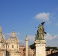 Santa Maria di Loreto church and statue in front of National Monument of Victor Emmanuel II, Rome, Italy Royalty Free Stock Photo