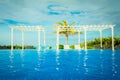 Orgeous inviting view of Golden Tulip hotel swimming pool area near the beach Royalty Free Stock Photo