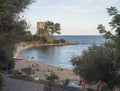 Santa Maria Navarrese, Sardinia, Italy, September 6, 2020: view of Spiaggia di Santa Maria Navarrese beach with group of relaxing Royalty Free Stock Photo