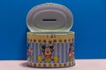 Old tin piggy bank disney collection with Mickey mouse print