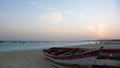 Colorful wooden fishing boats on the beach in Sal in Cape Verde at sunset Royalty Free Stock Photo