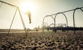 Santa monica beach. silhouette of a woman going up with the swing