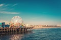 Santa Monica ferris wheel amusement park in sunset Royalty Free Stock Photo