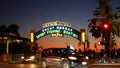 SANTA MONICA, LOS ANGELES CA USA - 19 DEC 2019: Summertime iconic vintage symbol. Classic illuminated retro sign on pier.