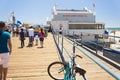 Santa monica pier with families walking in an hot afternoon in summer