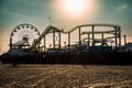 Santa Monica Pier at sunset - artistic shot captured during the golden hour