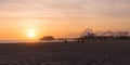 Santa Monica Pier sunset with cloud and orange sky, Los Angeles, USA Royalty Free Stock Photo