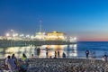 people enjoy the ocean park at Santa Monica pier by night Royalty Free Stock Photo