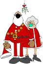Santa and Mrs. Claus standing under mistletoe and wearing face masks Royalty Free Stock Photo
