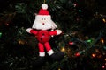 Santa Ornament with Jingle Bell on the Christmas Tree Royalty Free Stock Photo