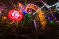 Santa Please stop here red sign and Christmas Light Decoration. Royalty Free Stock Photo