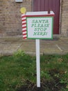Santa please stop here sign Royalty Free Stock Photo