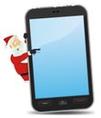 Santa Pointing Smartphone Royalty Free Stock Photo