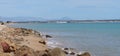 Panoramic view of Santa Pola, Alicante, Spain from the Pinet La Marina beach with the Puig Campana Mountain in the background