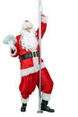 Santa is pole dancer, holds fan of dollars money notes. Santa Claus dances with pole on white background. Christmas Royalty Free Stock Photo