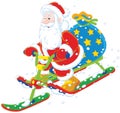 Santa riding a snow scooter Royalty Free Stock Photo