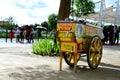 Vintage Ice Cream wooden Mobile Cart on city sidewalk