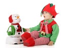 Santa's Elf Testing Toy Snowman Royalty Free Stock Photo