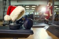 Santa`s hat in the gym. Royalty Free Stock Photo