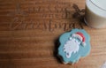Christmas milk and sugar cookie on Have Yourself a Merry Little Christmas wooden board Royalty Free Stock Photo