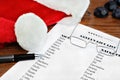 Santa`s Naughty And Nice Gift List With Glasses And Hat