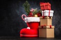 Santa`s shoe on dark background Royalty Free Stock Photo