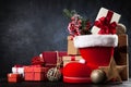 Santa`s shoe on dark background Royalty Free Stock Photo