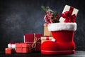 Santa`s shoe on dark background Royalty Free Stock Photo