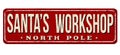 Santa`s workshop vintage rusty metal sign Royalty Free Stock Photo