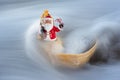 Santa in a Seashell with Ocean Spray Royalty Free Stock Photo