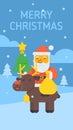 Santa sitting on reindeer holding gift bag and Christmas tree