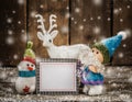 Santa snowman and reindeer with card. Royalty Free Stock Photo