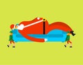 Santa on sofa carry elves. Xmas grandfather sleeping on couch an Royalty Free Stock Photo