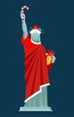 Santa Statue of Liberty. Candy cane and gift box. Monument in suit of Claus. Christmas hat and red clothes. USA Patriot National