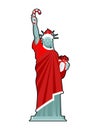 Santa Statue of Liberty. Candy cane and gift box. Monument in suit of Claus. Christmas hat and red clothes. USA Patriot National