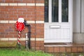 Santa stop here at Christmas seasonal sign at poor council estate