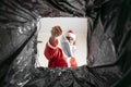 Santa throws a disposable mask in the trash. covid dissident