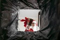 Santa throws gifts in the trash