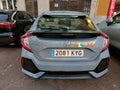 SANTA URSULA, SPAIN - JULY 21, 2023: Gray Honda Civic parked on a street. Honda is known for its reliability, expertise and