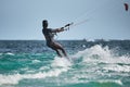 Santa Veronica, Colombia 2021. African black women kitesurfing on the sea water