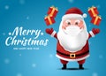 Santa wearing mask on blue background Royalty Free Stock Photo