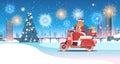 Santa woman delivering gifts on scooter merry christmas happy new year holiday celebration concept Royalty Free Stock Photo