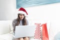 Santa woman doing online shopping Royalty Free Stock Photo